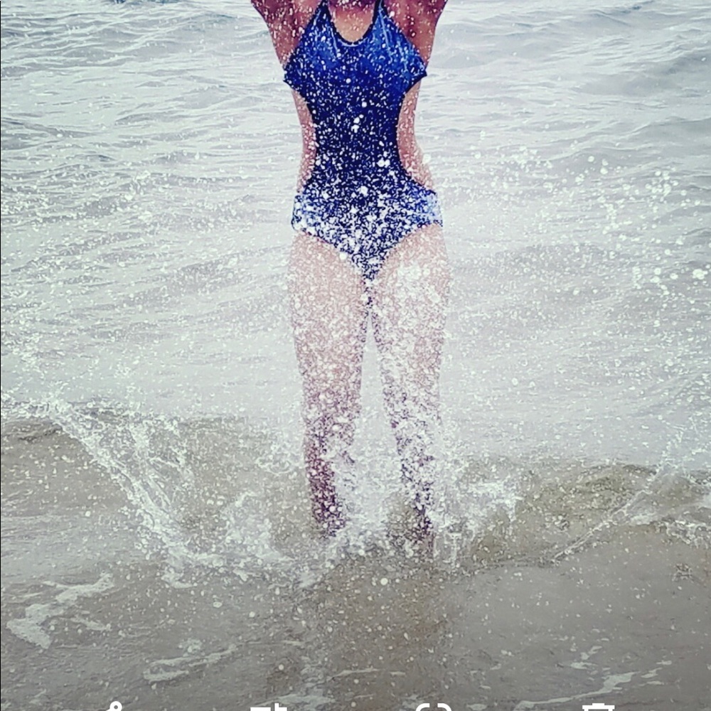 blue bathing suit with velvet finish.